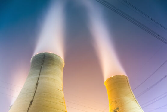 the cooling towers at night of the nuclear power generation plant