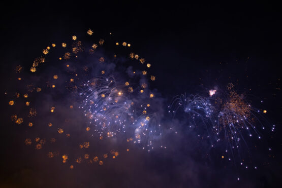 Fireworks at New Year and copy space - abstract holiday background